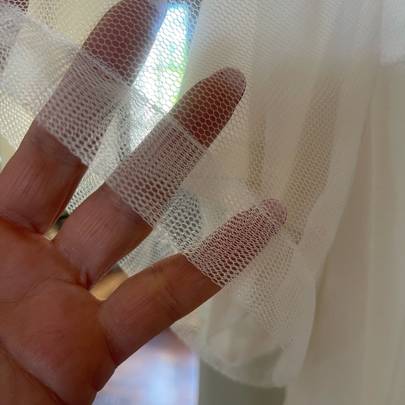 Tiers of tulle are layered atop a perfectly-cut T-shirt with added lace accents. - Picture 10 of 10